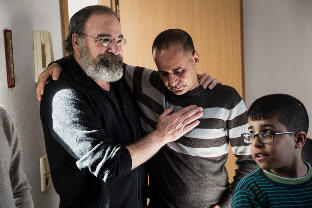 International Rescue Committee ambassador, and actor, Mandy Patinkin, reconnects with a Syrian refugee family.